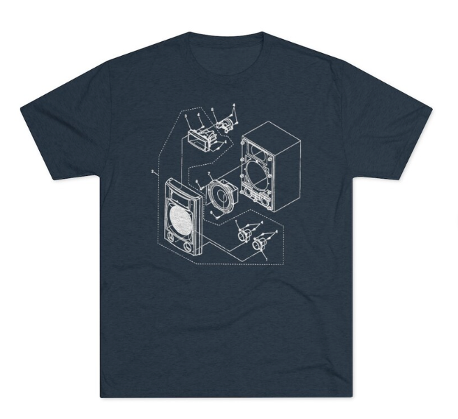 a blue t - shirt with a drawing of a washing machine