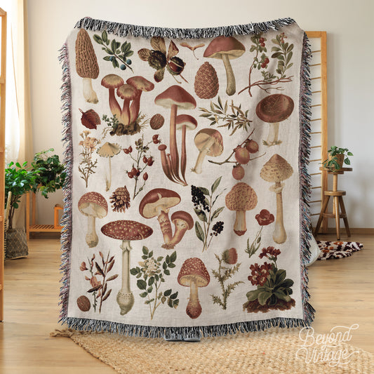 a blanket with a bunch of mushrooms on it