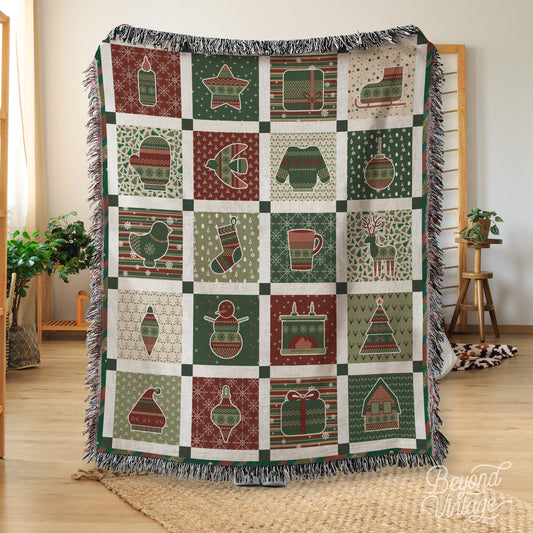 a green and red quilt on a wooden floor