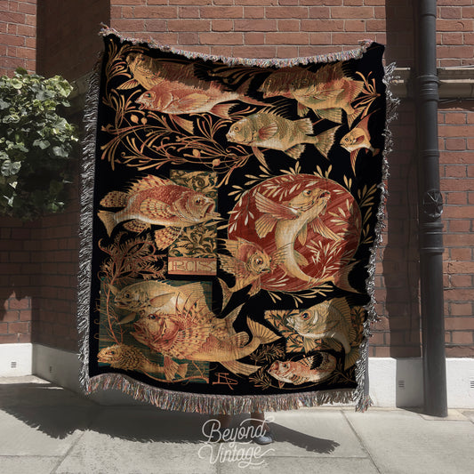 a tapestry hanging on a pole on a sidewalk