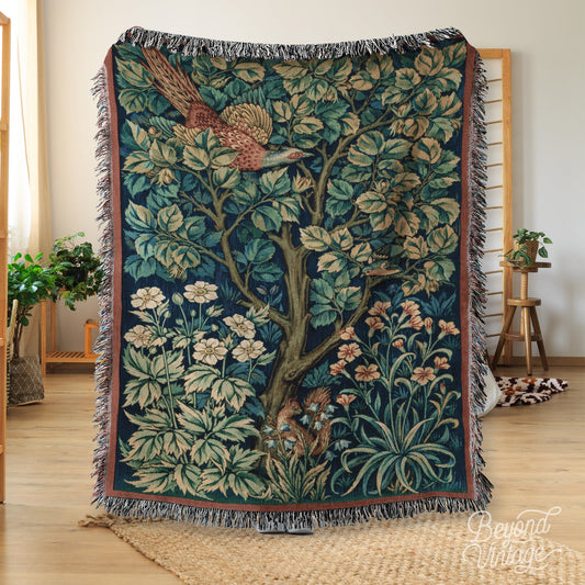 a tapestry of a tree with a bird on it