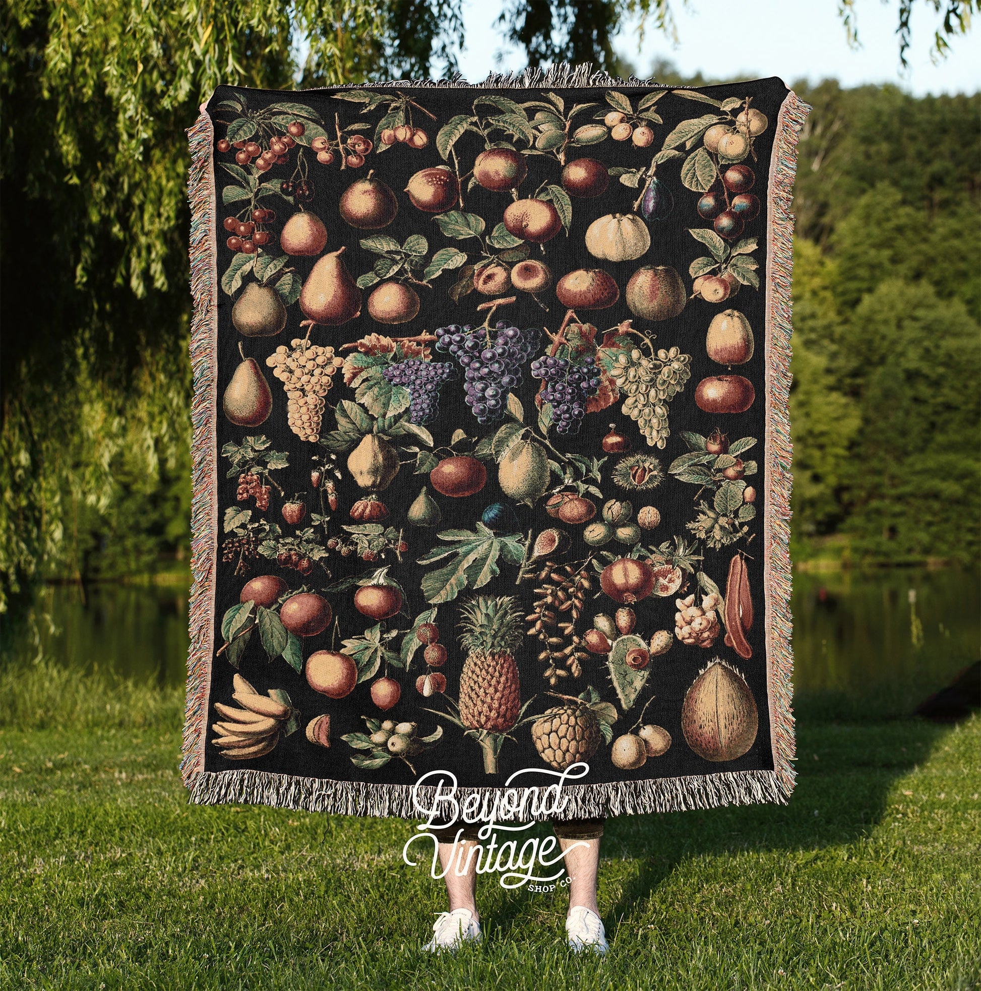 a blanket with a picture of fruit on it