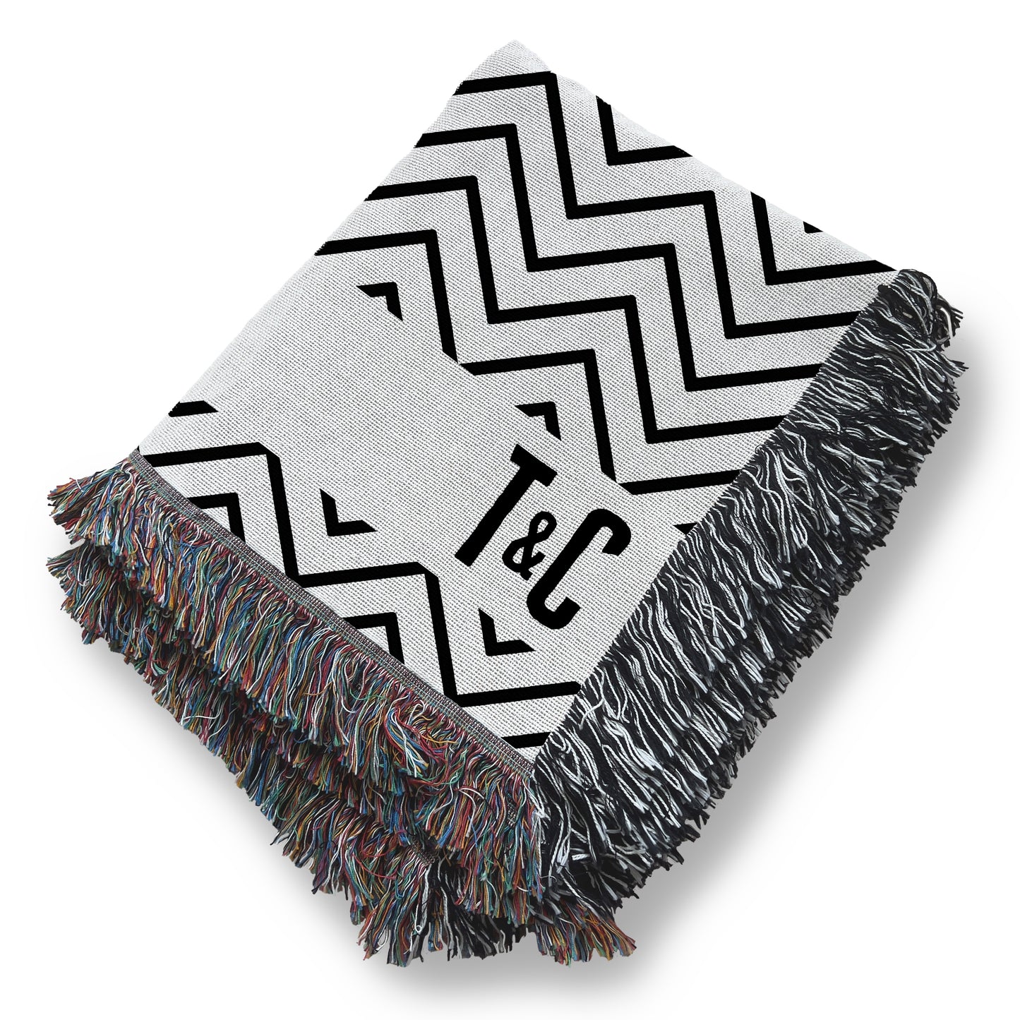 a black and white blanket with a black and white zigzag pattern