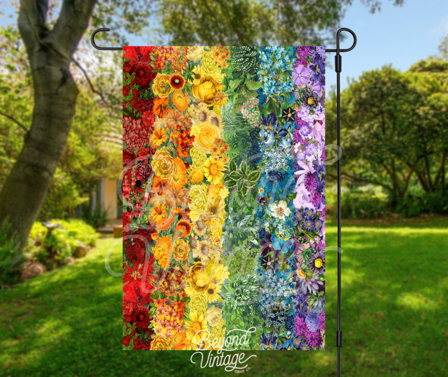 a colorful quilt hanging on a clothes line