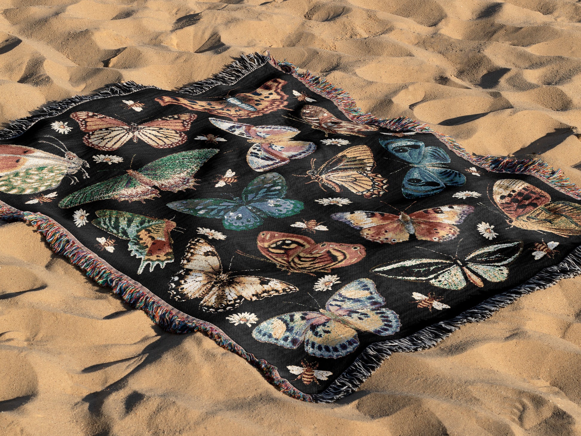 a blanket with a bunch of butterflies on it