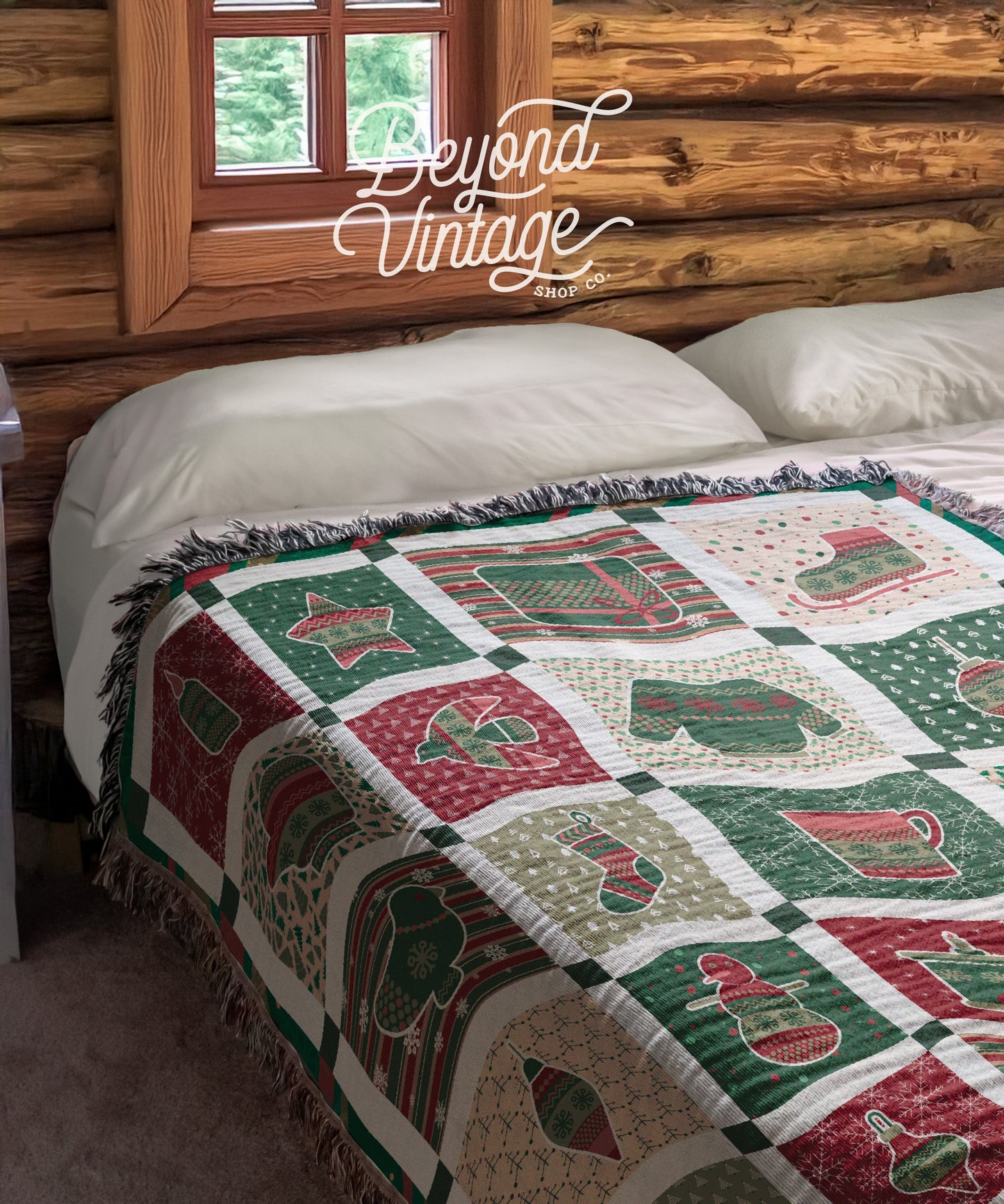 a bed with a quilt on top of it next to a window