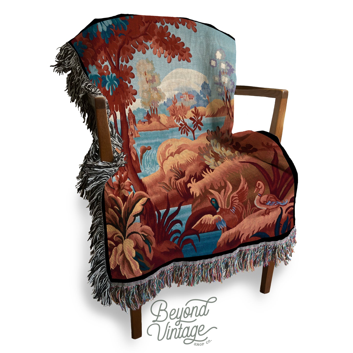 a wooden chair with a tapestry on it