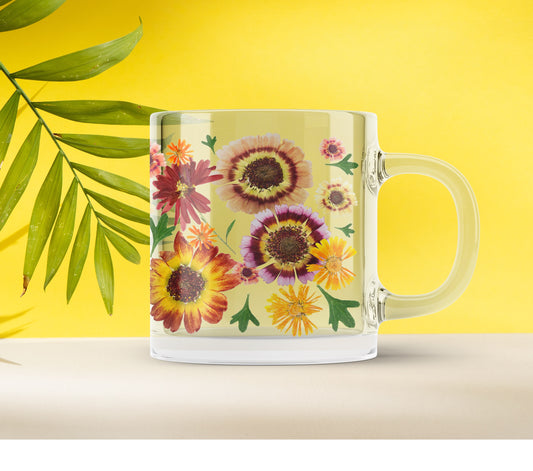 a coffee mug with a picture of flowers on it