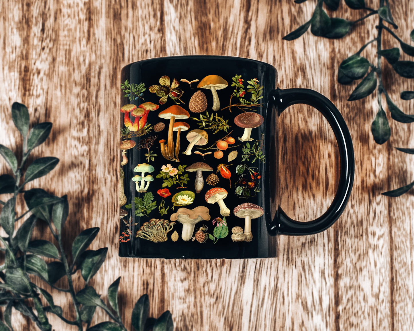 a black coffee mug filled with different types of mushrooms