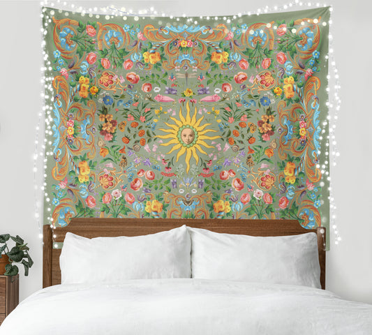 a bed with a white comforter and a tapestry on the wall